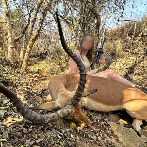 Lady hunter with kudu
