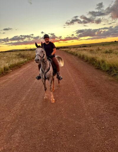 Anri riding at golden sunset