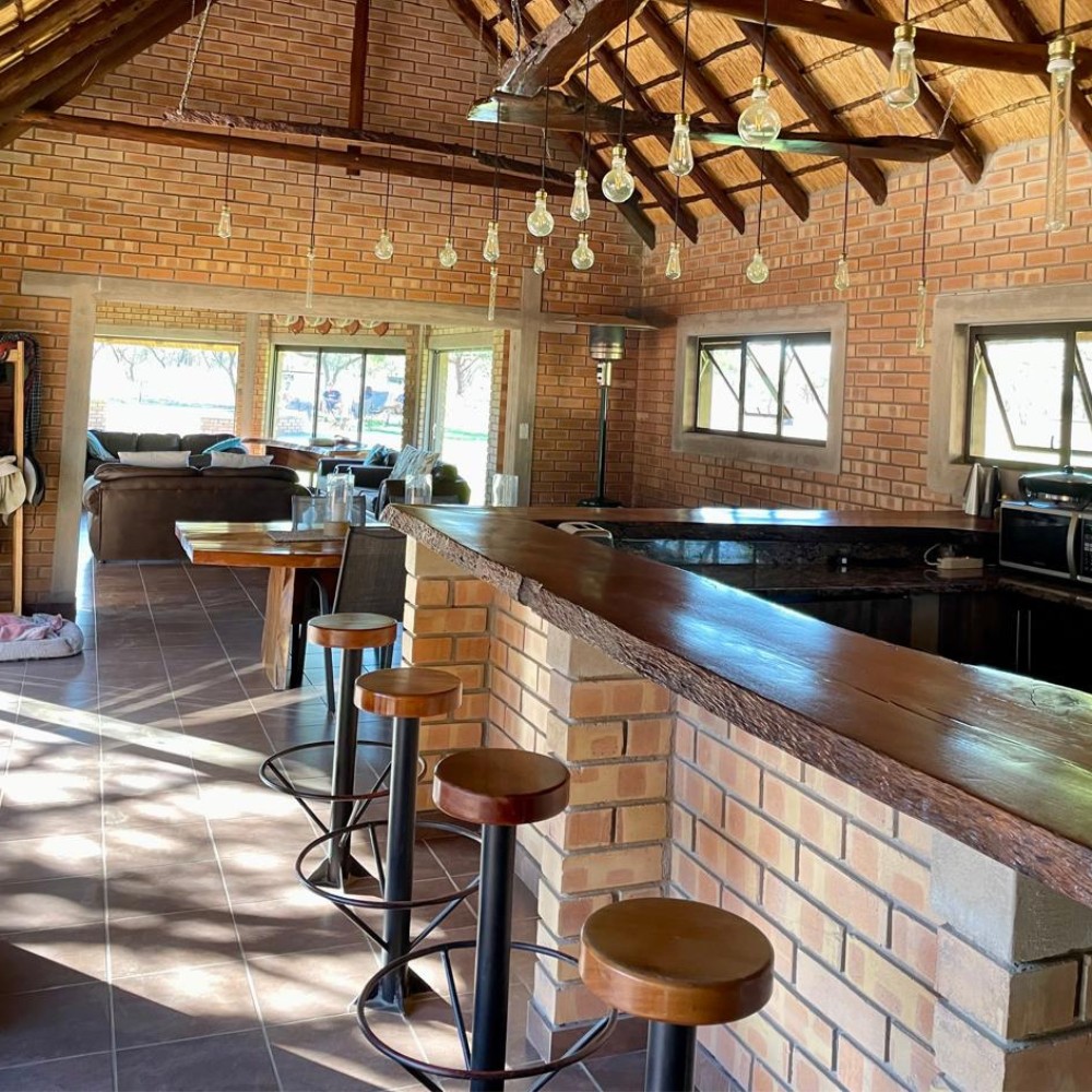 Lodge bar — brick counter and Edison lights